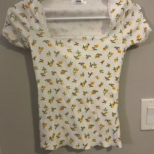 Electric Family White Tee with Yellow and Green Floral Design